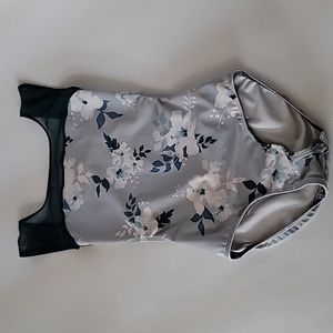 Eleve leotard child large. baby blue,white,cream,flowers with  teal mesh sleeves